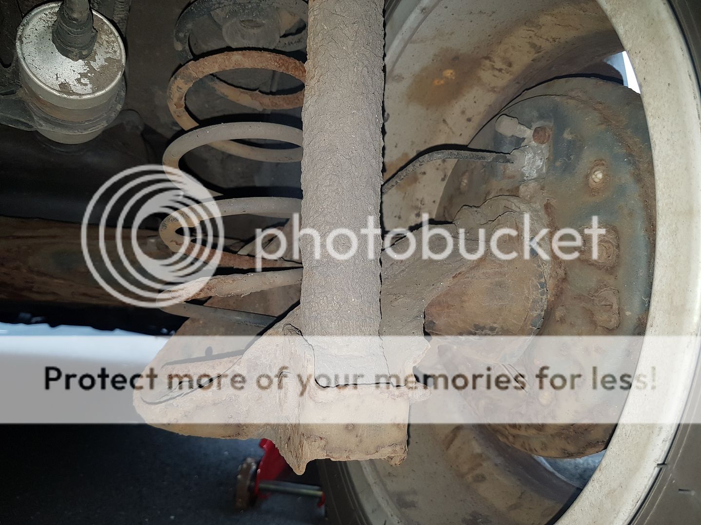 suspension arm corroded and seriously weakened both rear side